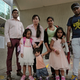Asylum seekers, from left: Ajith Pushpa Kumara, Vanessa Mae Rodel and her daughter Keana, Nadeeka Dilrukshi Nonis and her son Dinath and daughter Sethmundi Kellapatha, and Supun Thilina Kellapatha, pose outside the building of Hong Kong's immigration department in Hong Kong, Monday, May 15, 2017. The Hong Kong lawyer for a group of refugees who sheltered former NSA contractor Edward Snowden four years ago says the southern Chinese city's immigration department has rejected their asylum requests. The applicants are from the Philippines and Sri Lanka.